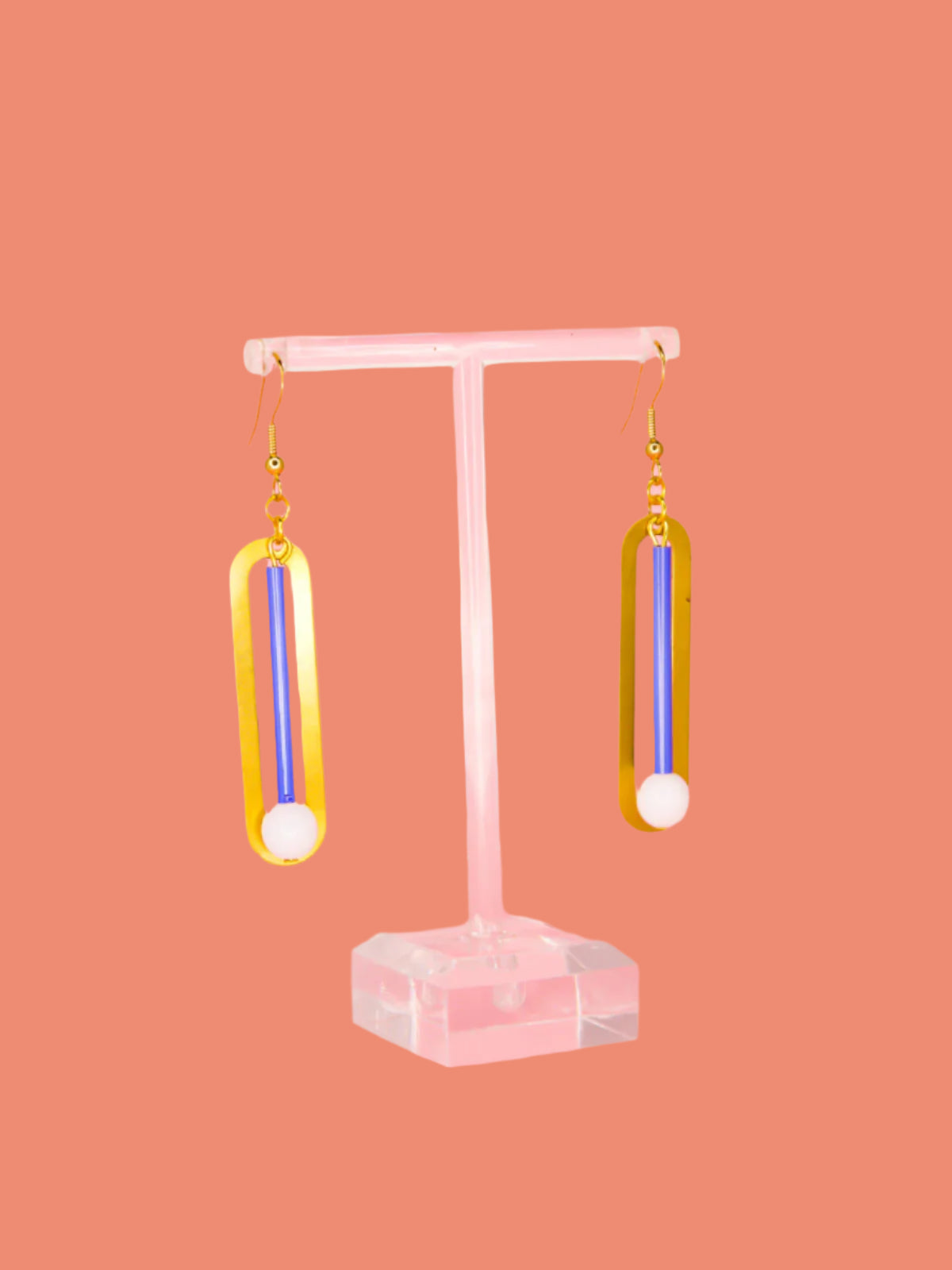 Blue & white glass beads hung from a rectangle brass with gold plated ear wires