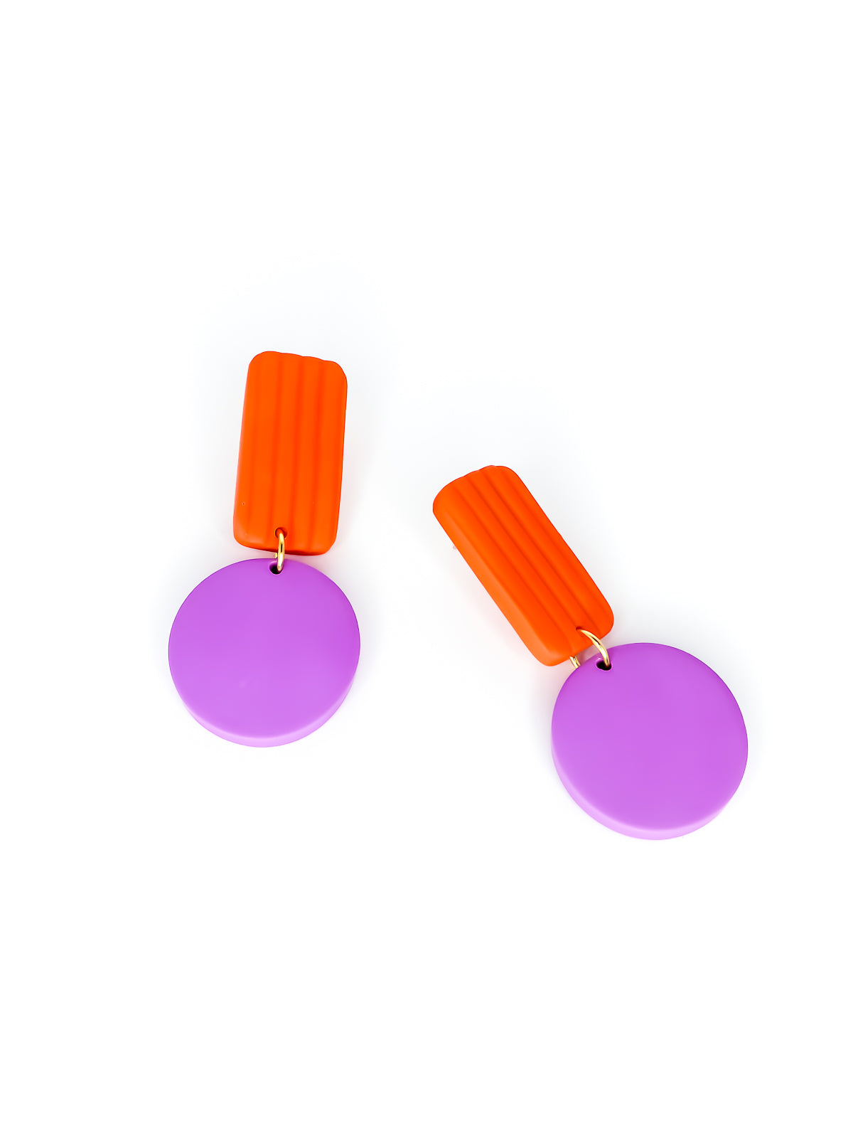 Pair of geometric earrings with striped orange rectangles and purple circles on a white background