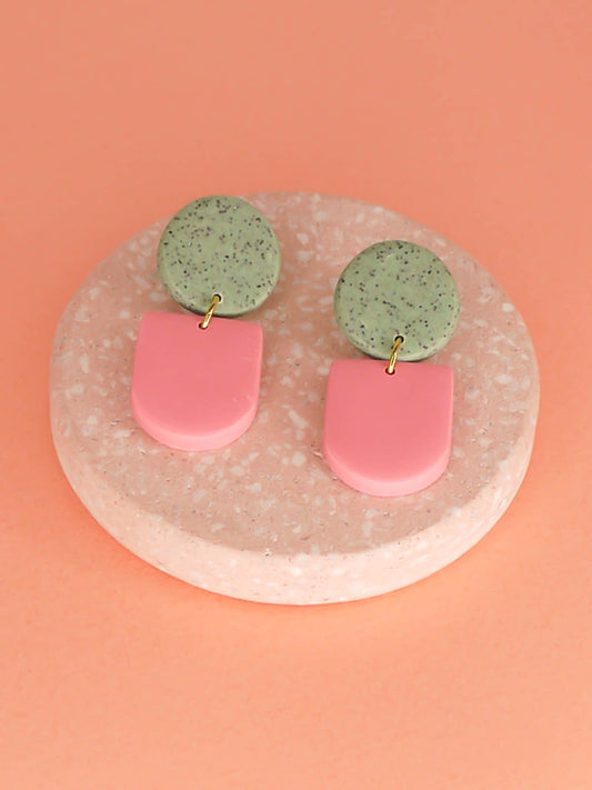 Lightweight statement arch dangle earrings with a pink arch and green granite stud, with stainless steel posts, handmade out of polymer clay