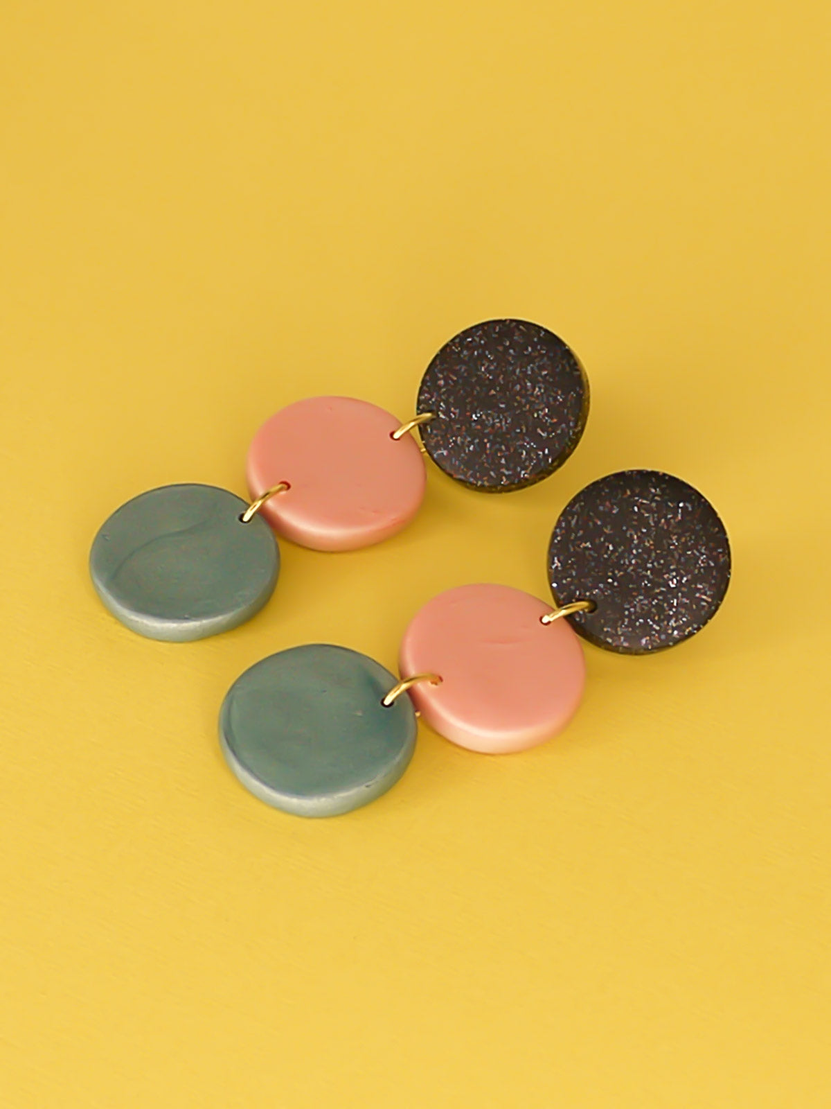 3 tier metallic drop circle statement earrings in black glitter, rose gold and turquoise with stainless steel posts made from lightweight polymer clay