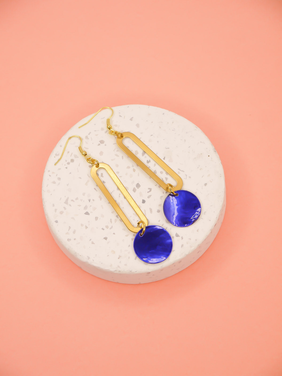 Long rectangle brass sticks with blue shell disks hung from gold plated ear wires