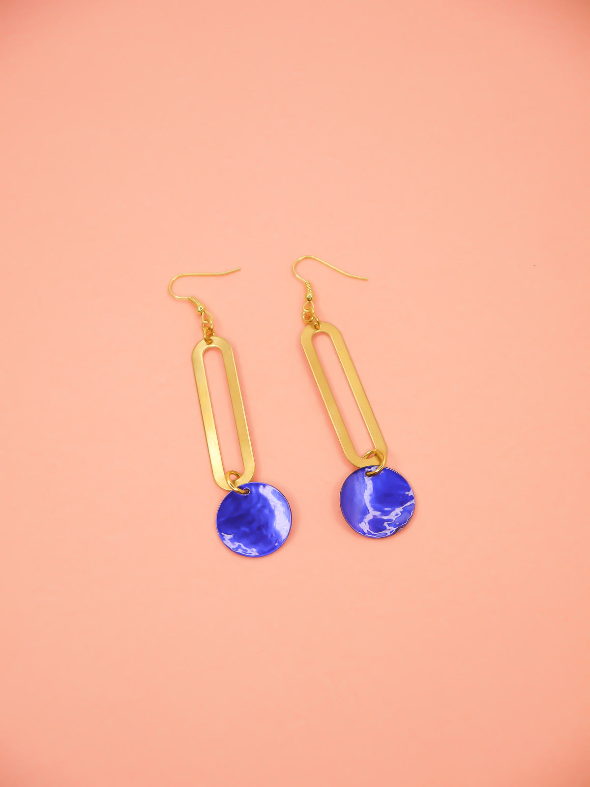 Long rectangle brass sticks with blue shell disks hung from gold plated ear wires