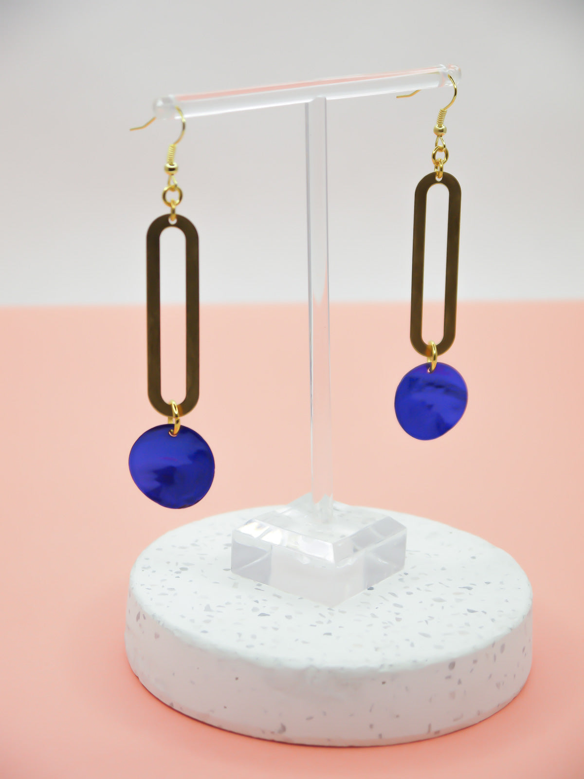 Long rectangle brass sticks with blue shell disks hung from gold plated ear wires