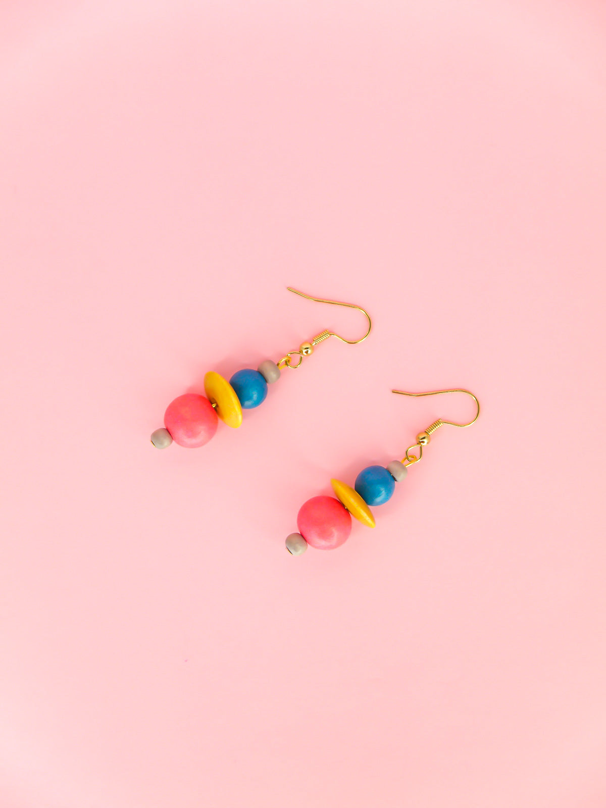 Colourful lightweight wooden bead dangle earrings in grey, blue, yellow & pink beads, hung from gold plated ear wires