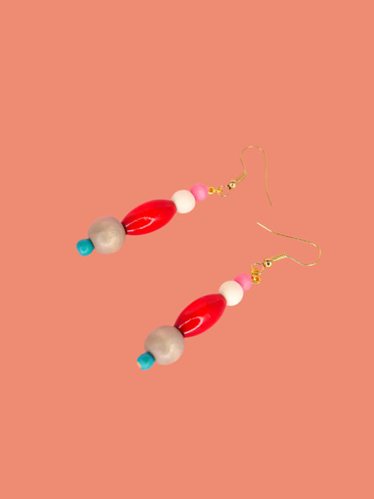 Colourful lightweight wooden bead dangle earrings in various shaped beads in pink, white, red, grey & blue, hung from gold plated ear wires
