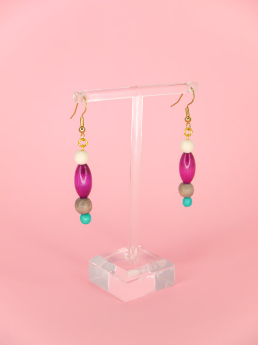 Colourful lightweight beaded dangle earrings in various shaped beads in white, purple, grey & blue, hung from gold plated ear wires