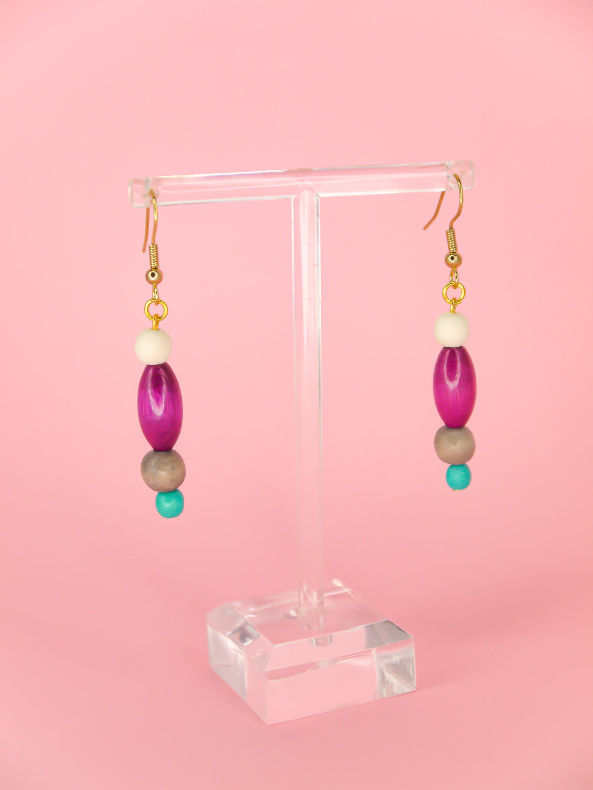 Colourful lightweight beaded dangle earrings in various shaped beads in white, purple, grey & blue, hung from gold plated ear wires