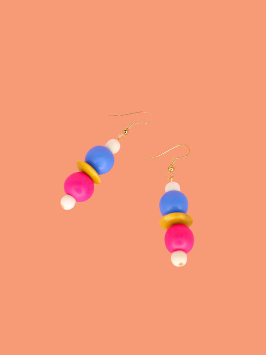 Colourful lightweight wooden bead dangle earrings in white, blue, pink & yellow various sized beads, hung from gold plated ear wires
