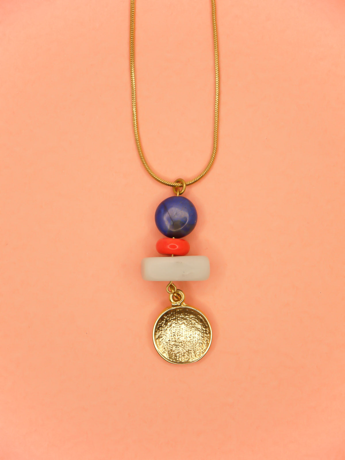 Crystal gemstone pendant necklace with lapis lazuli, coral and amazonite bead stack with a 24k shiny gold hammered disk medallion strung on a 24k gold plated snake chain