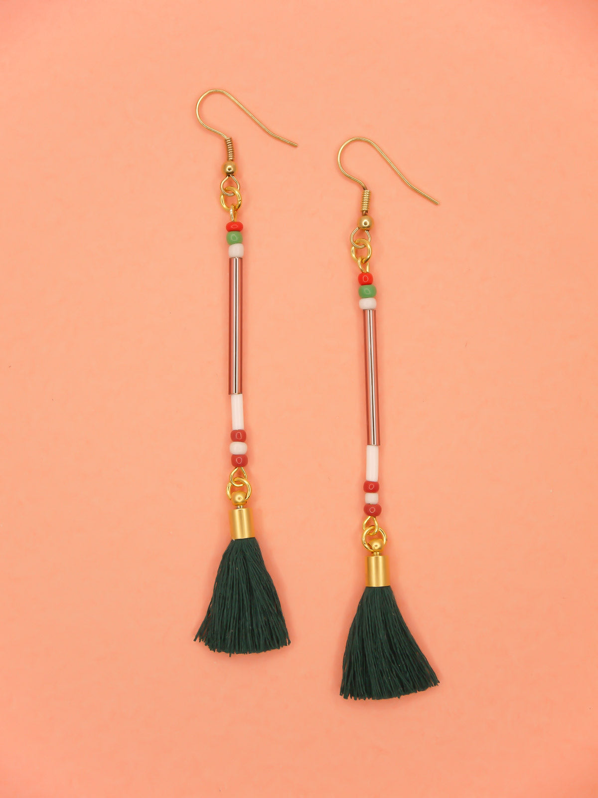 Lightweight long delicate bead stick dangle earrings with lilac glass tube beads & contrasting seed beads in green, white & red, paired with a dark green cotton tassel. Hung from gold plated nickel free ear wires.