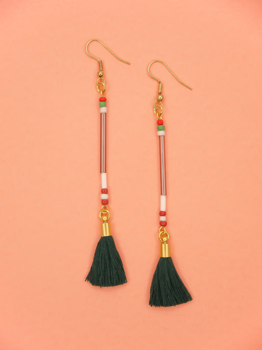 Lightweight long delicate bead stick dangle earrings with lilac glass tube beads & contrasting seed beads in green, white & red, paired with a dark green cotton tassel. Hung from gold plated nickel free ear wires.