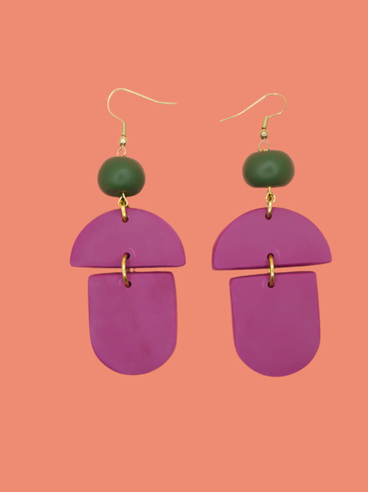 Geometric lightweight dangle statement earrings in magenta arch and semi circles with a hand rolled green bead hung from gold plated nickel free ear wires