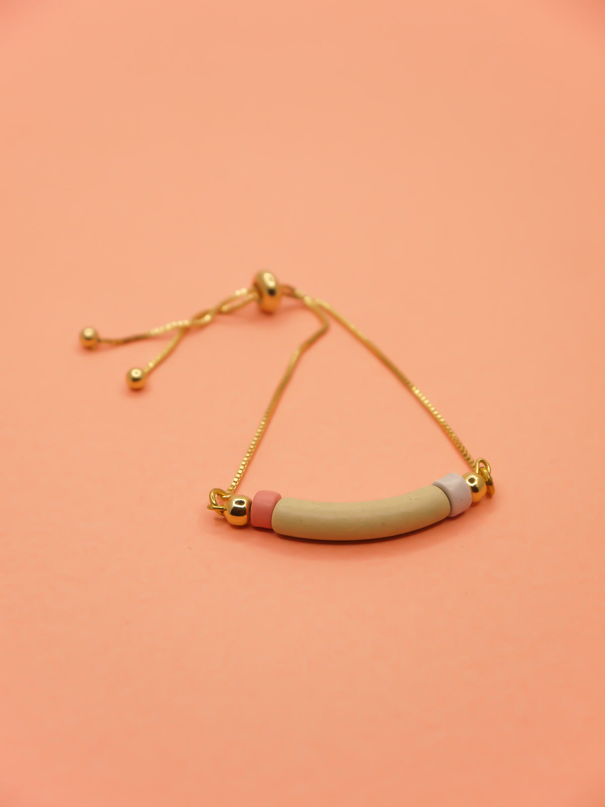 Pistachio curved ceramic bead gold chain bracelet