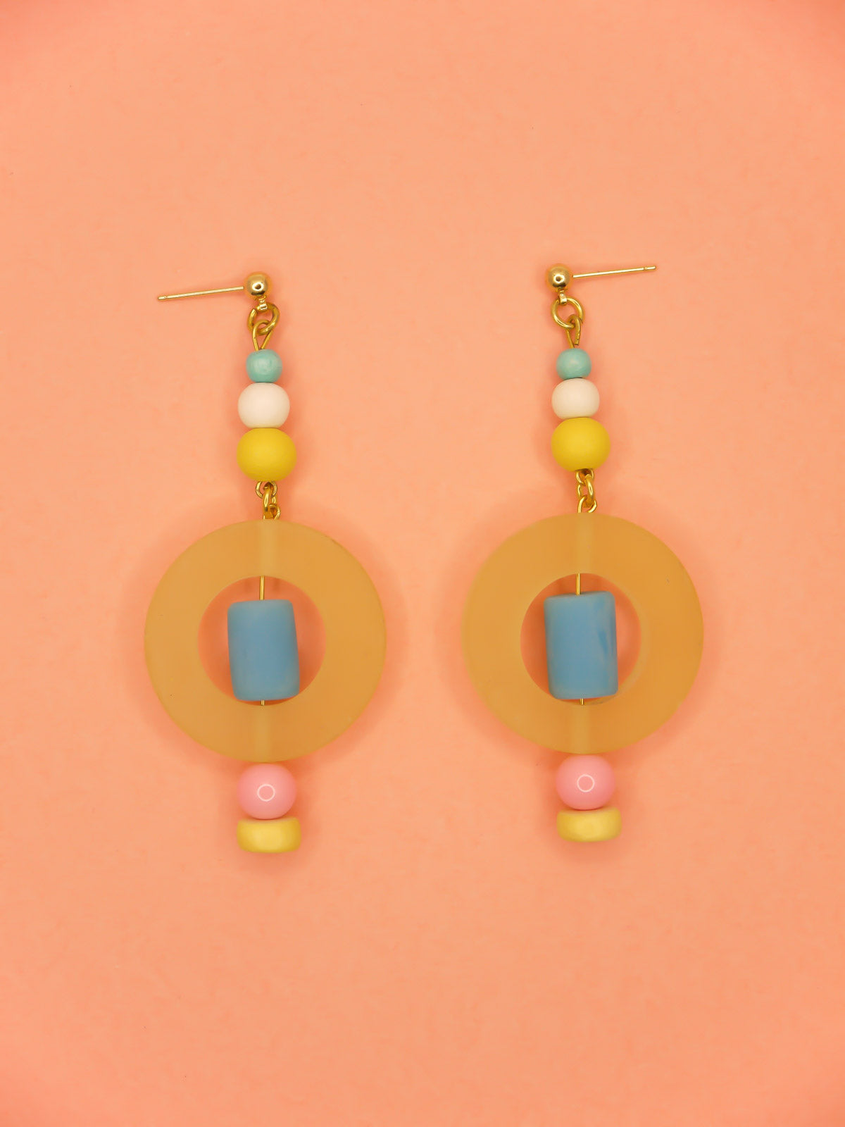 Colourful lightweight hoop bead earrings with glass & wood beads in yellow, pink & turquoise with a resin yellow hoop in the centre & a resin blue tube bead in the middle. Hung from 24k gold plated ball studs.