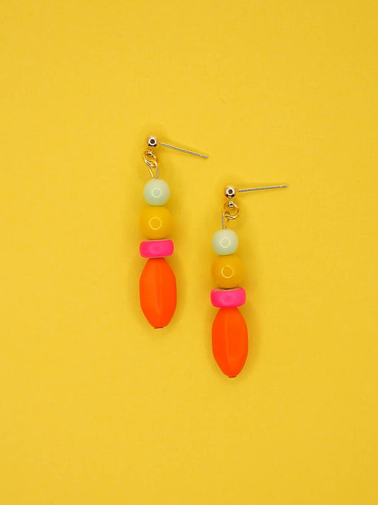 Colourful bright bead drop earrings made of a mix of glass, wood and resin beads in multi colours of mint, yellow, hot pink and orange. Hung from 24k gold plated brass ball studs.