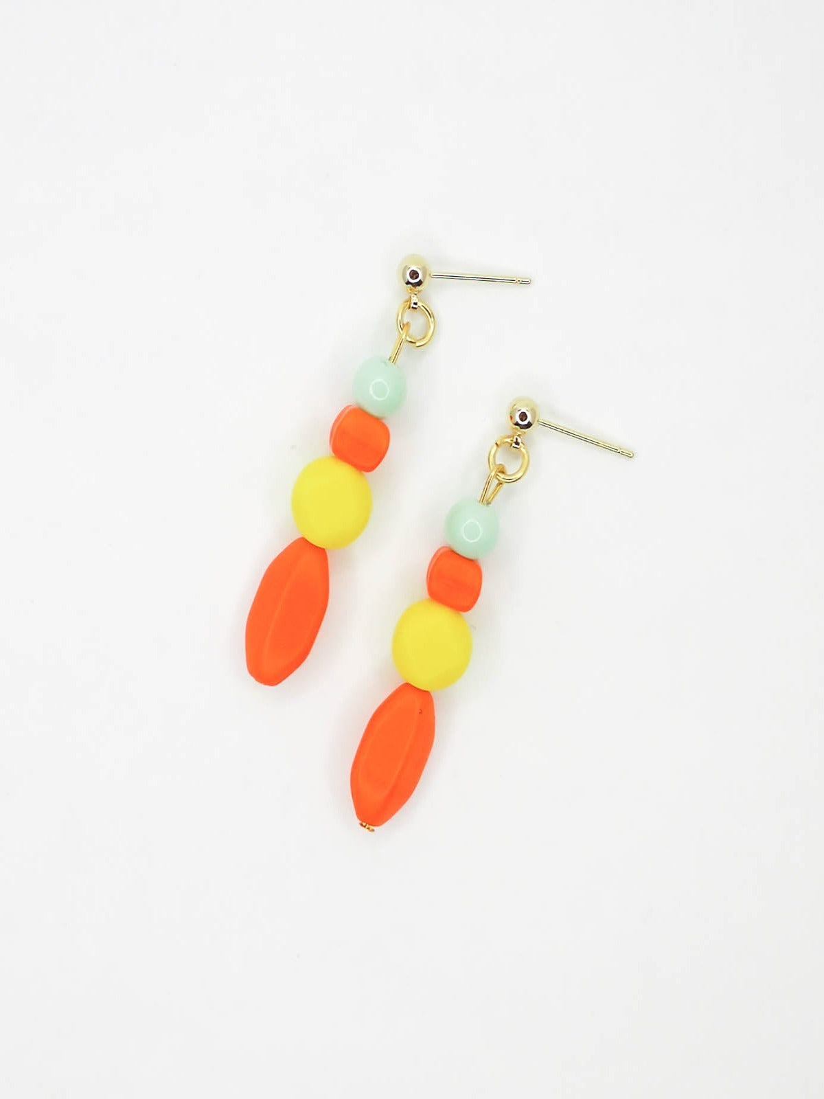 Geometric colour block bead drop earrings in multi coloured resin and glass beads in orange, yellow and mint hung from 24k gold plated brass ball studs.