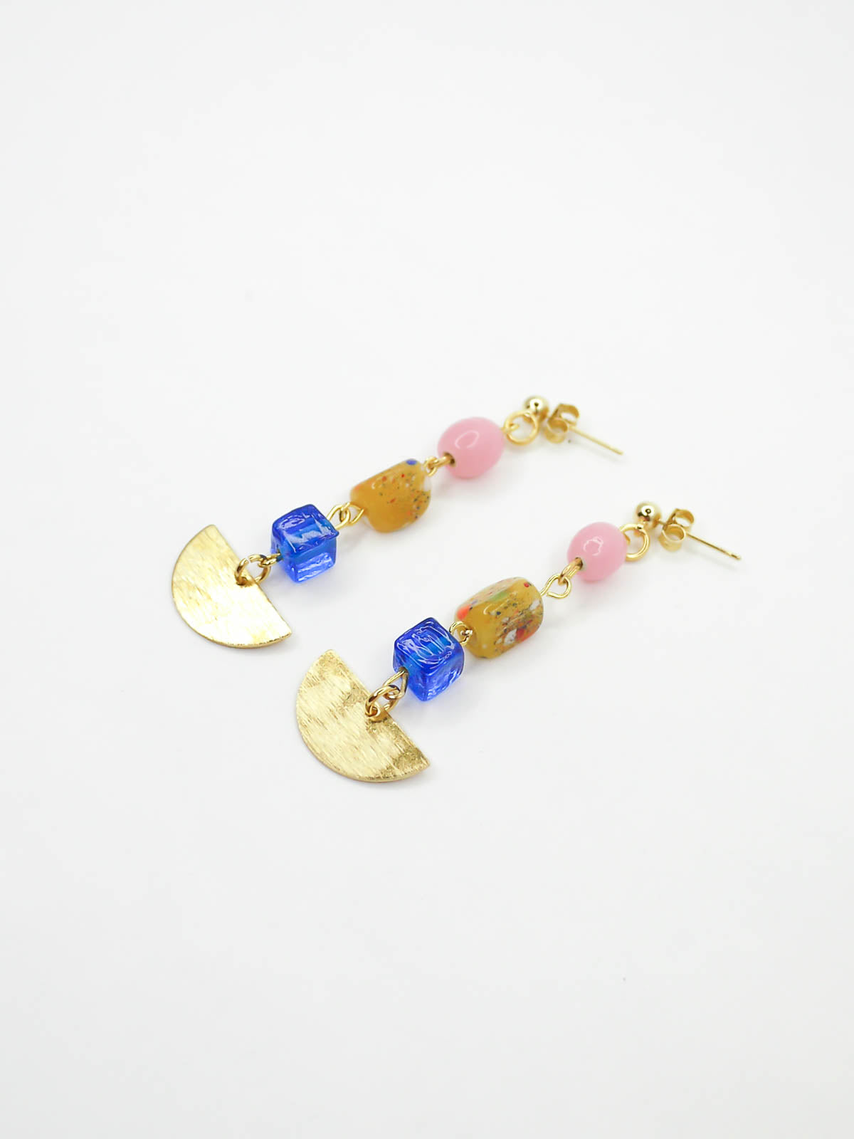 Colourful glass bead dangle earrings in pink, speckled yellow and blue glass beads with a textured brass semi circle charm, hung from 24k gold plated ball studs