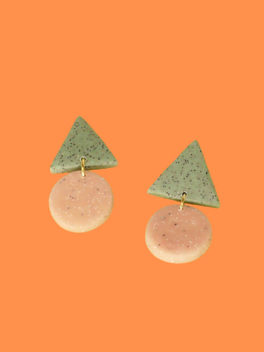 Geometric stud dangle earrings with a granite green triangle stud and a peach granite circle with stainless steel posts