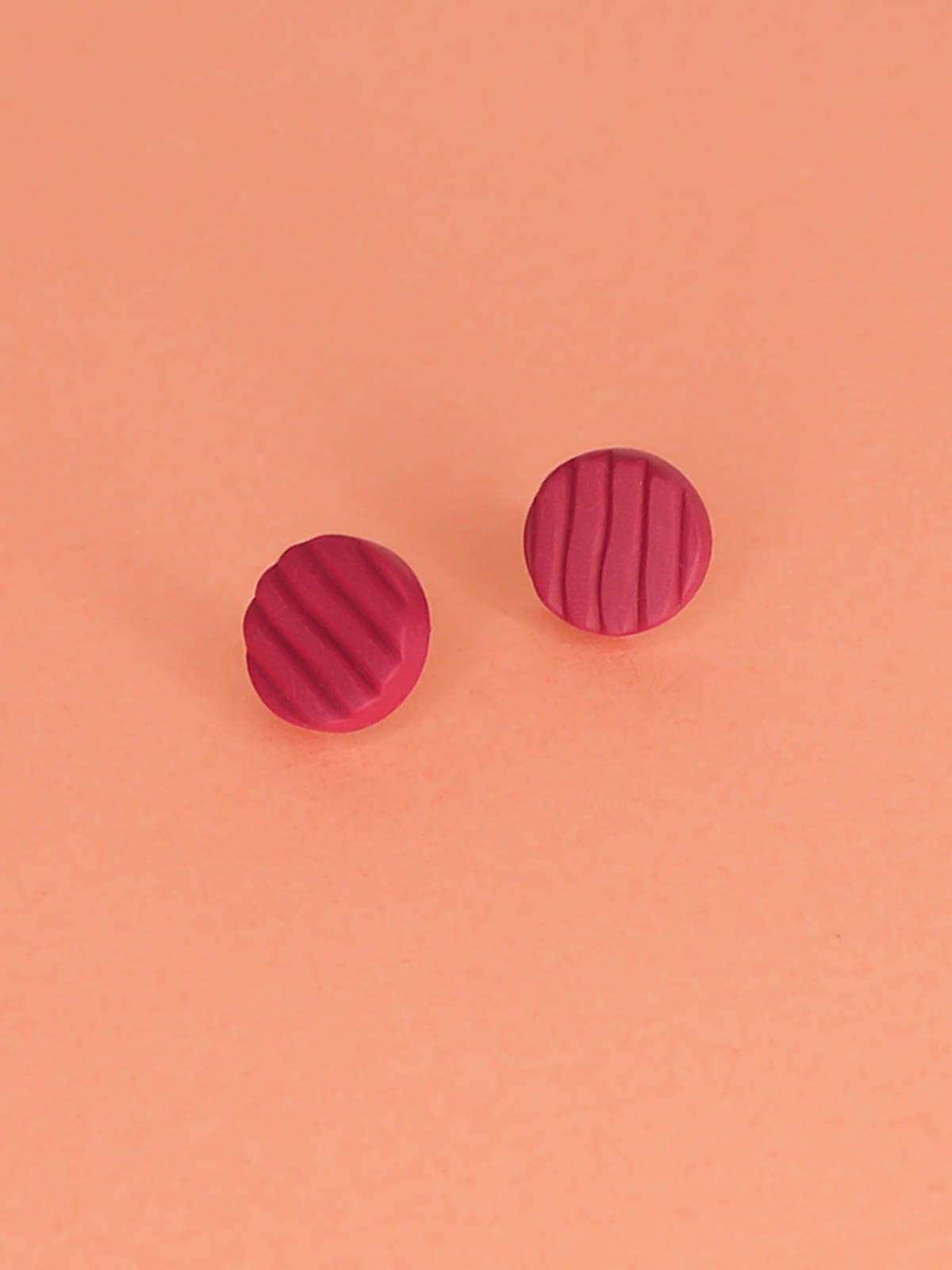 Mini magenta textured striped polymer clay stud earrings