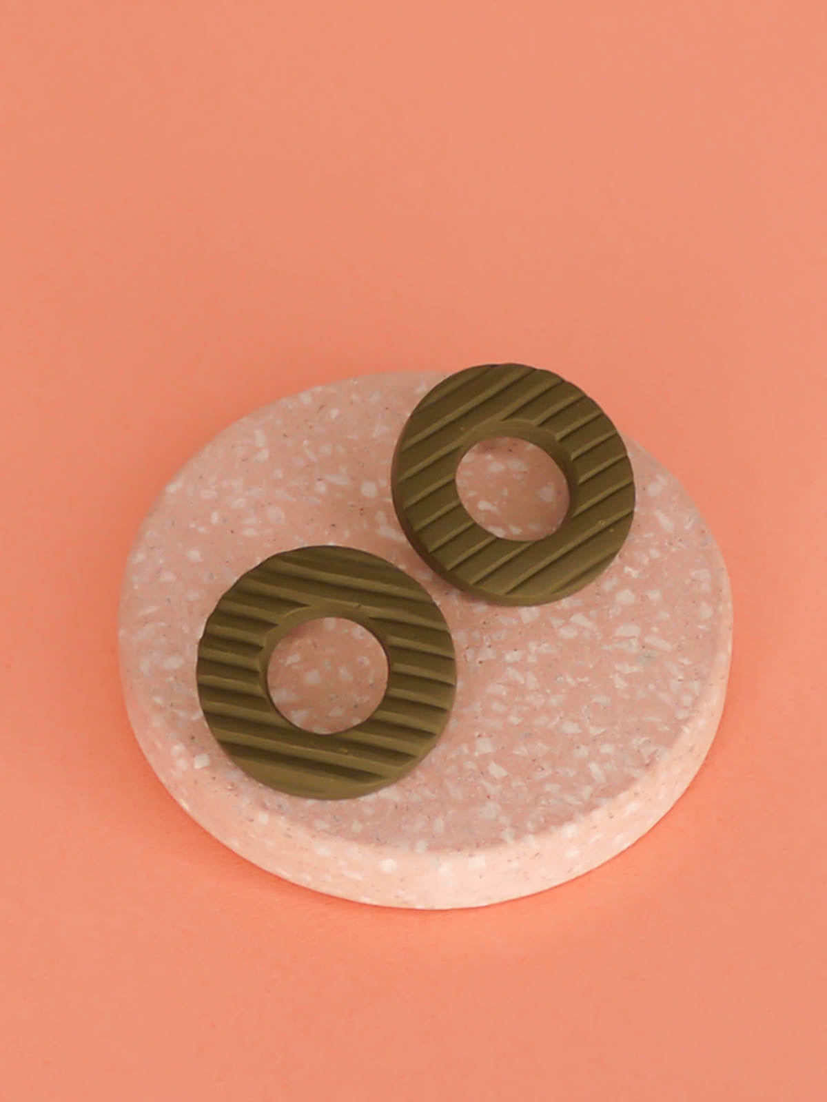 Olive green striped textured hoop stud earrings in lightweight polymer clay