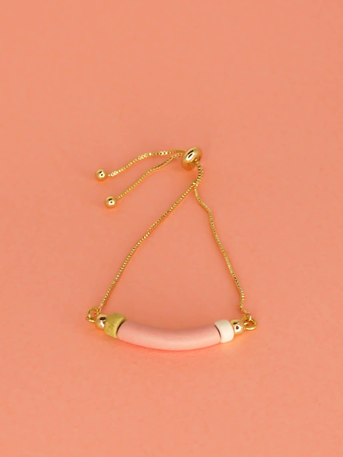 Pink curved ceramic bead gold chain bracelet