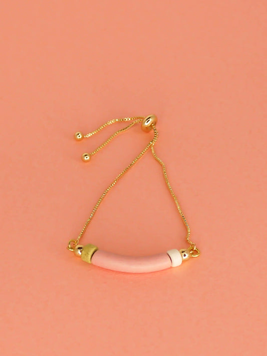 Pink curved ceramic bead gold chain bracelet