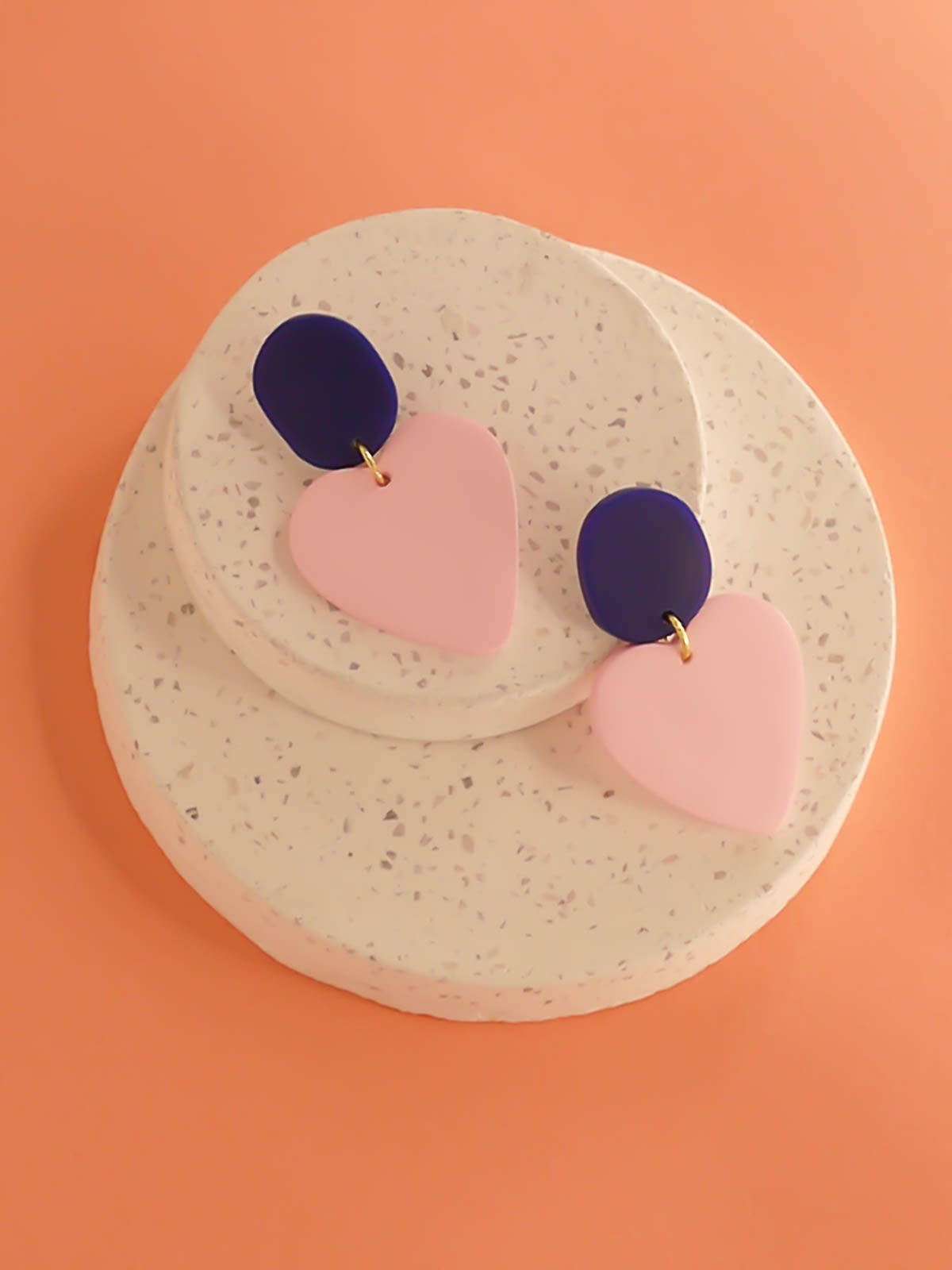 Colour block polymer clay statement dangle earrings with a dusty pink heart paired with a cobalt rectangle stud & stainless steel posts