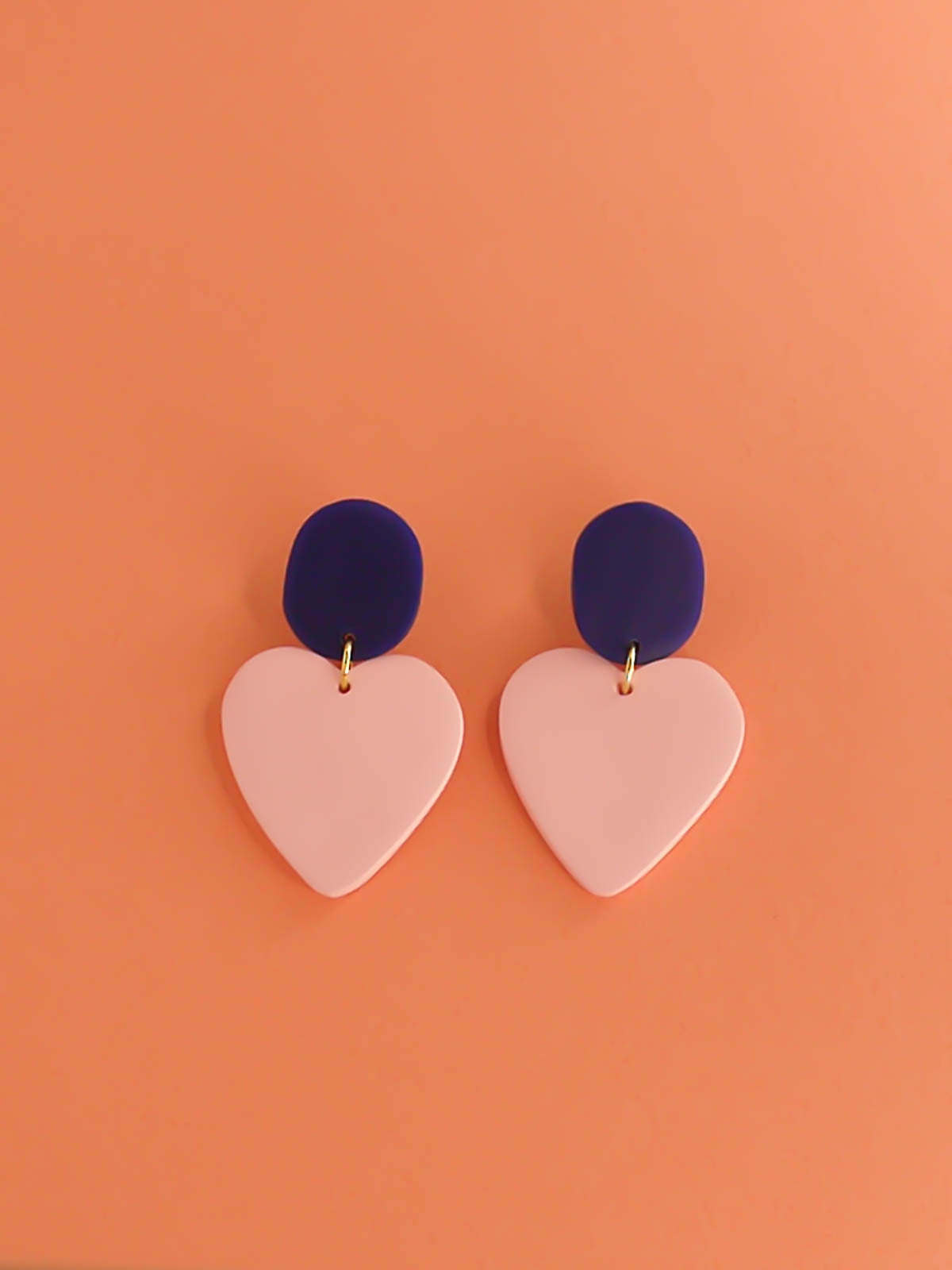 Colour block polymer clay statement dangle earrings with a dusty pink heart paired with a cobalt rectangle stud & stainless steel posts