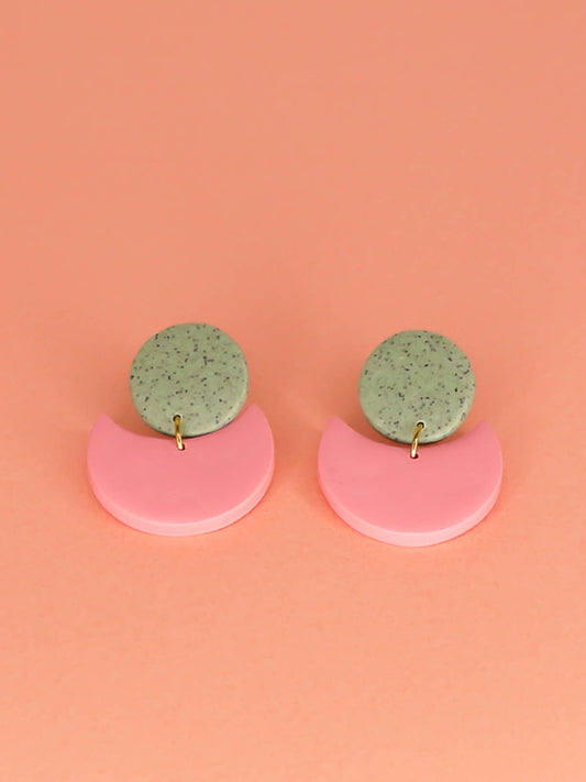 Geometric pink & green crescent statement earrings with a green granite stud and a pink semi circle, with stainless steel posts, handmade from polymer clay.