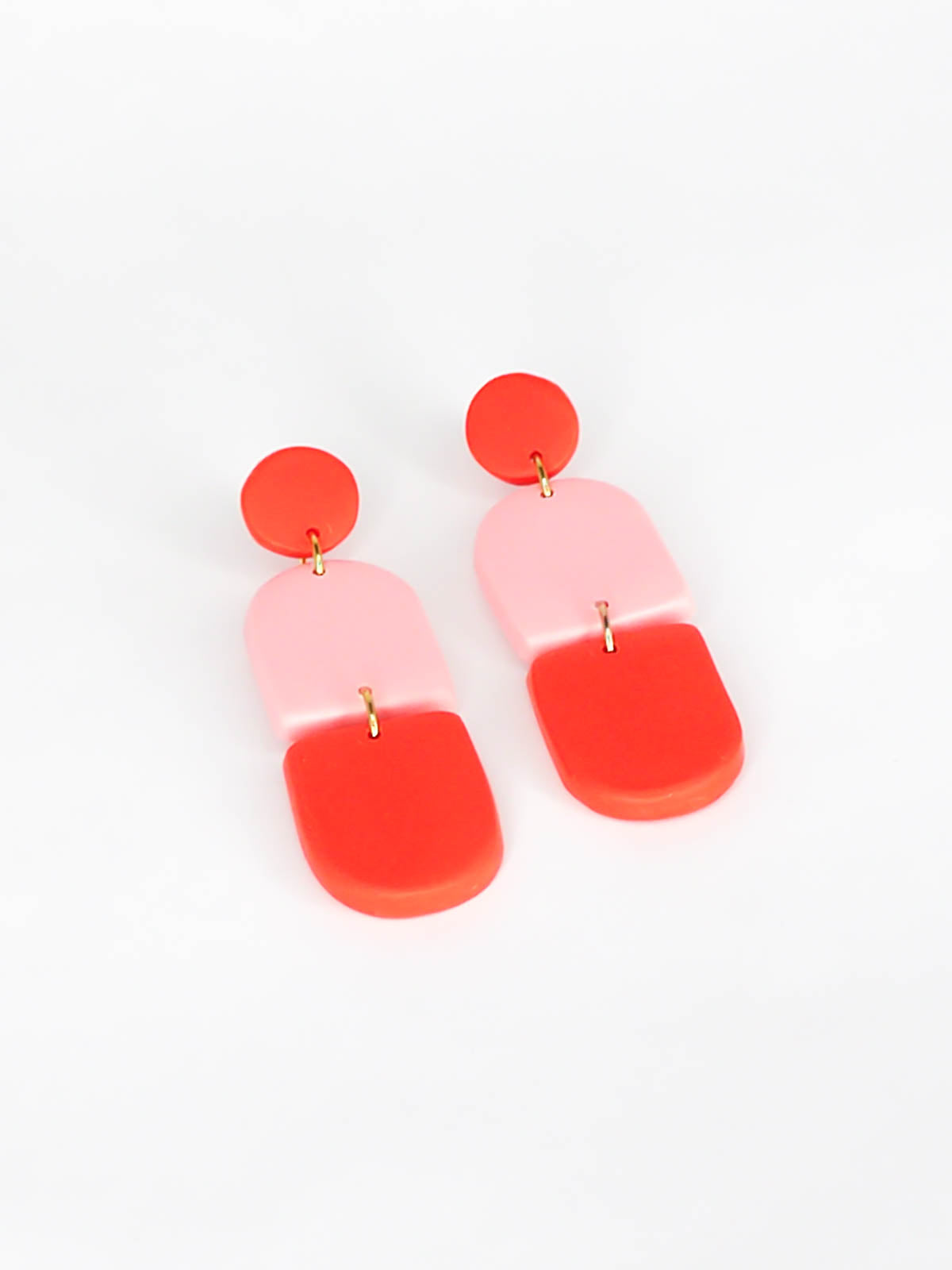 Colour block polymer clay pink & red arch dangle earrings with a red stud and stainless steel posts