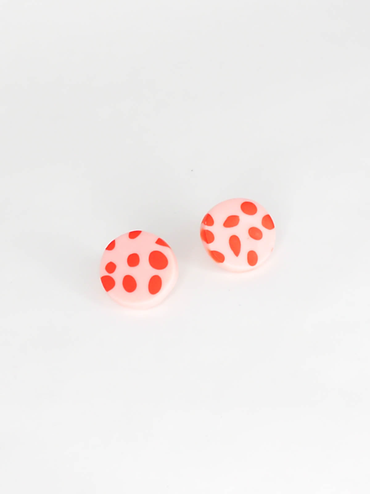 Pink and red spotted stud earrings with stainless steel posts