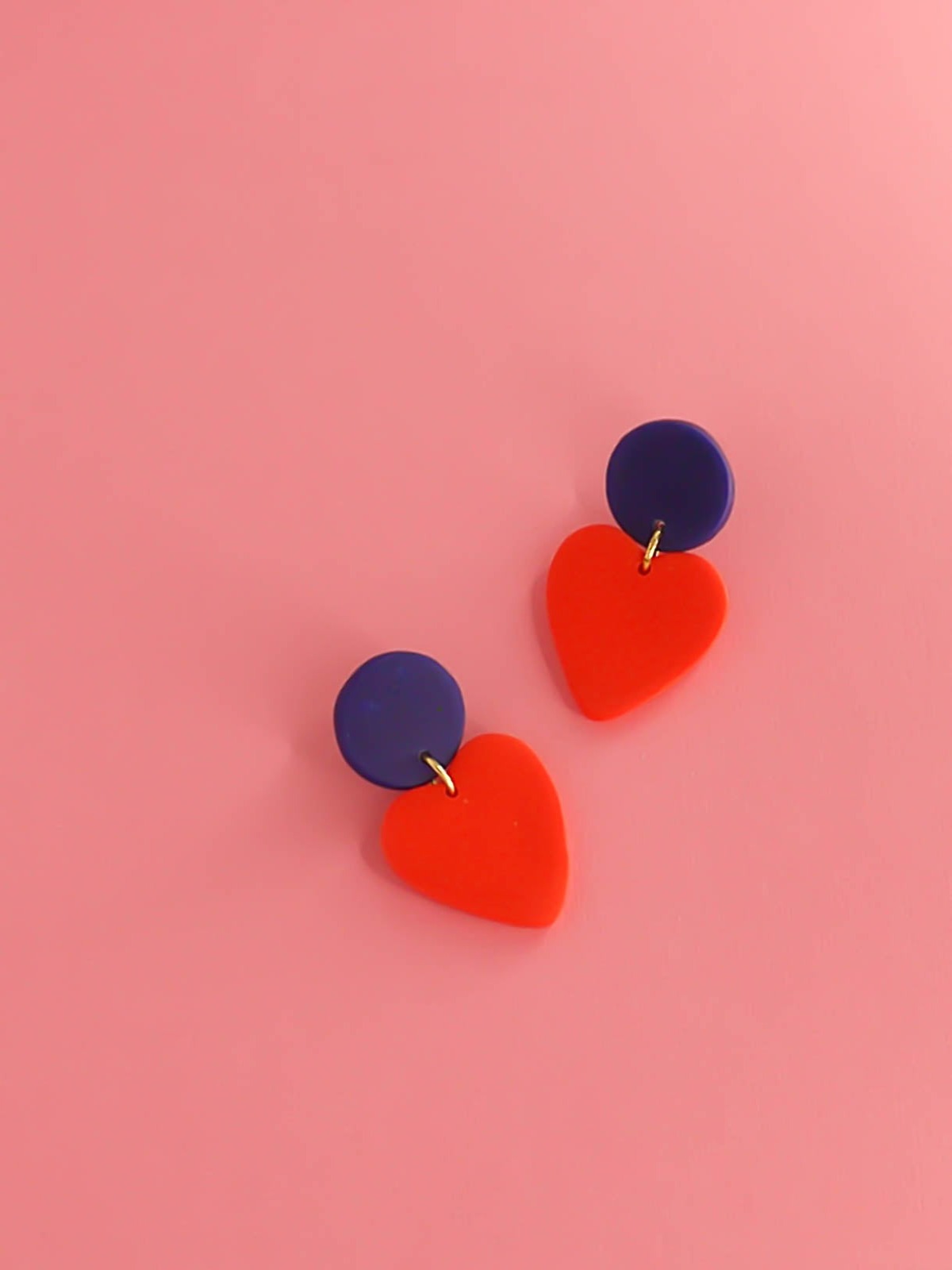 Colour block polymer clay statement earrings in bright red hearts with cobalt blue circle studs with stainless steel posts