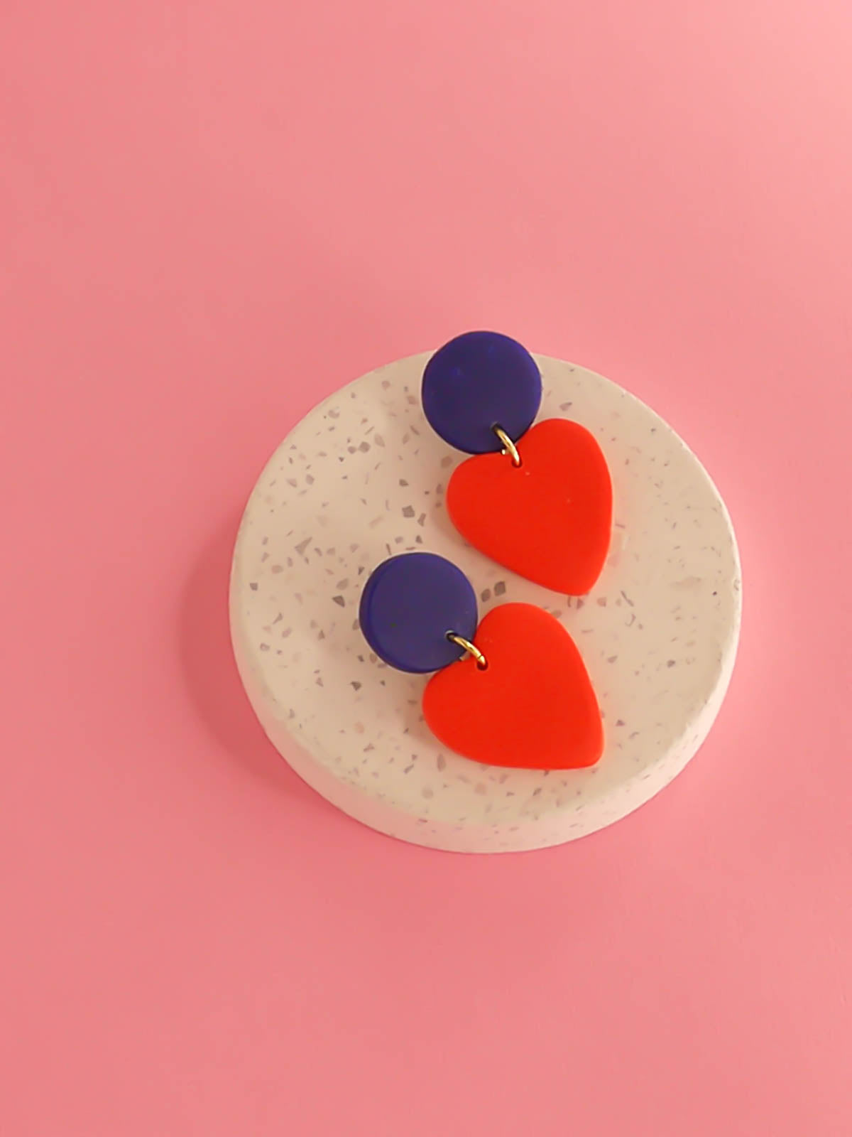 Colour block polymer clay statement earrings in bright red hearts with cobalt blue circle studs with stainless steel posts