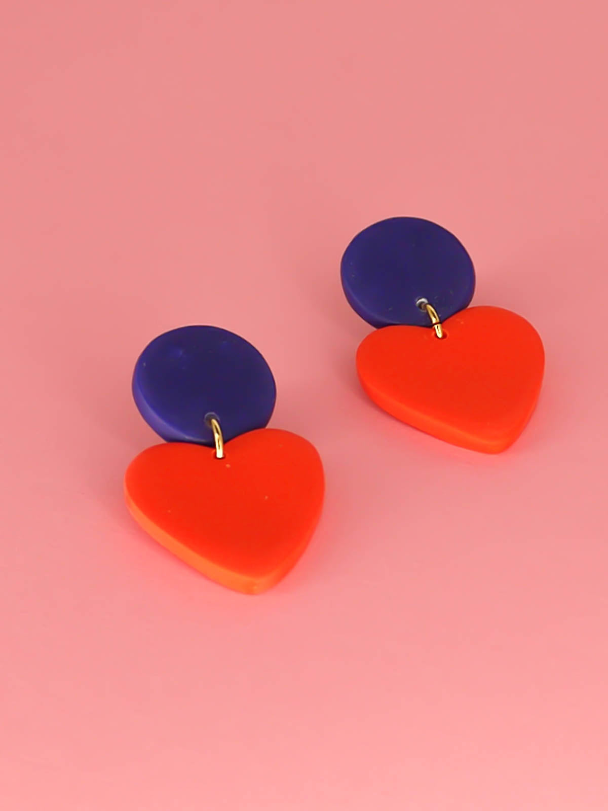 Colour block polymer clay statement earrings in bright red hearts with cobalt blue circle studs with stainless steel posts