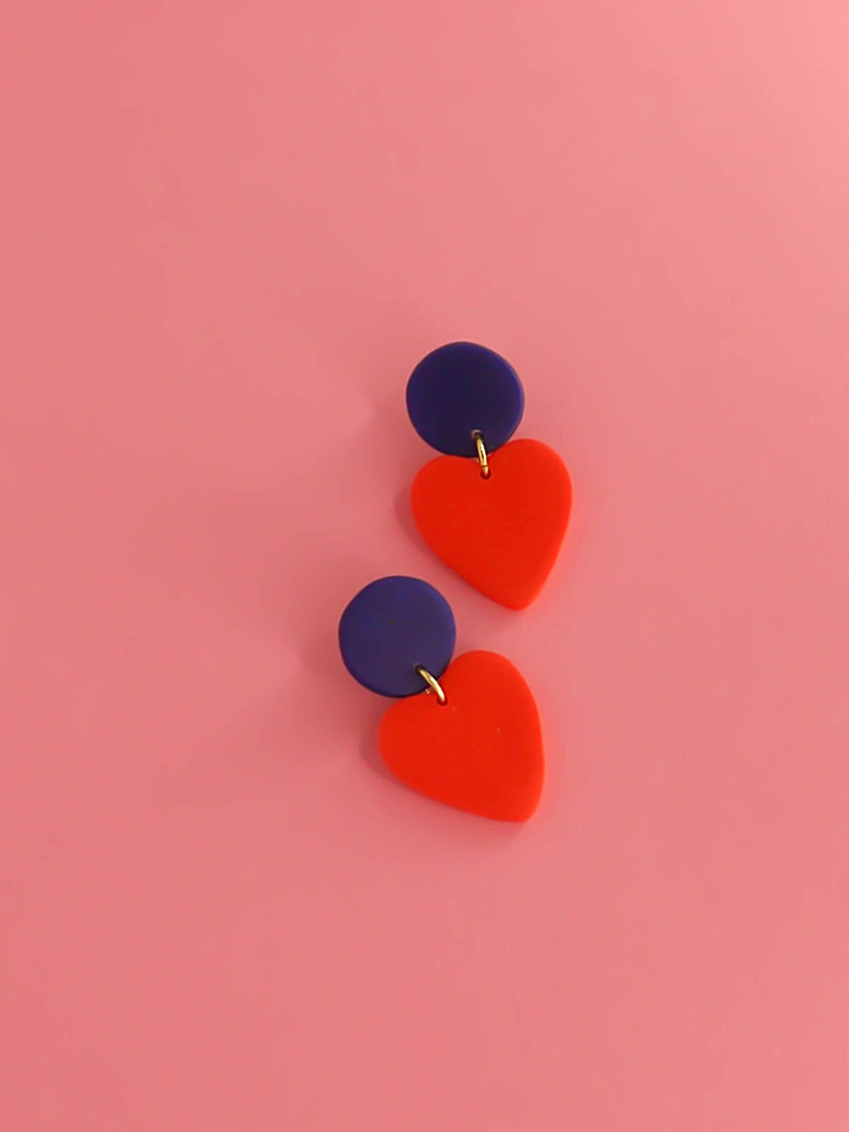 Colour block polymer clay statement earrings in bright red hearts with cobalt blue circle studs with stainless steel posts