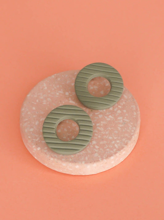 Sage green textured stripe hoop stud earrings, made out of polymer clay with stainless steel posts