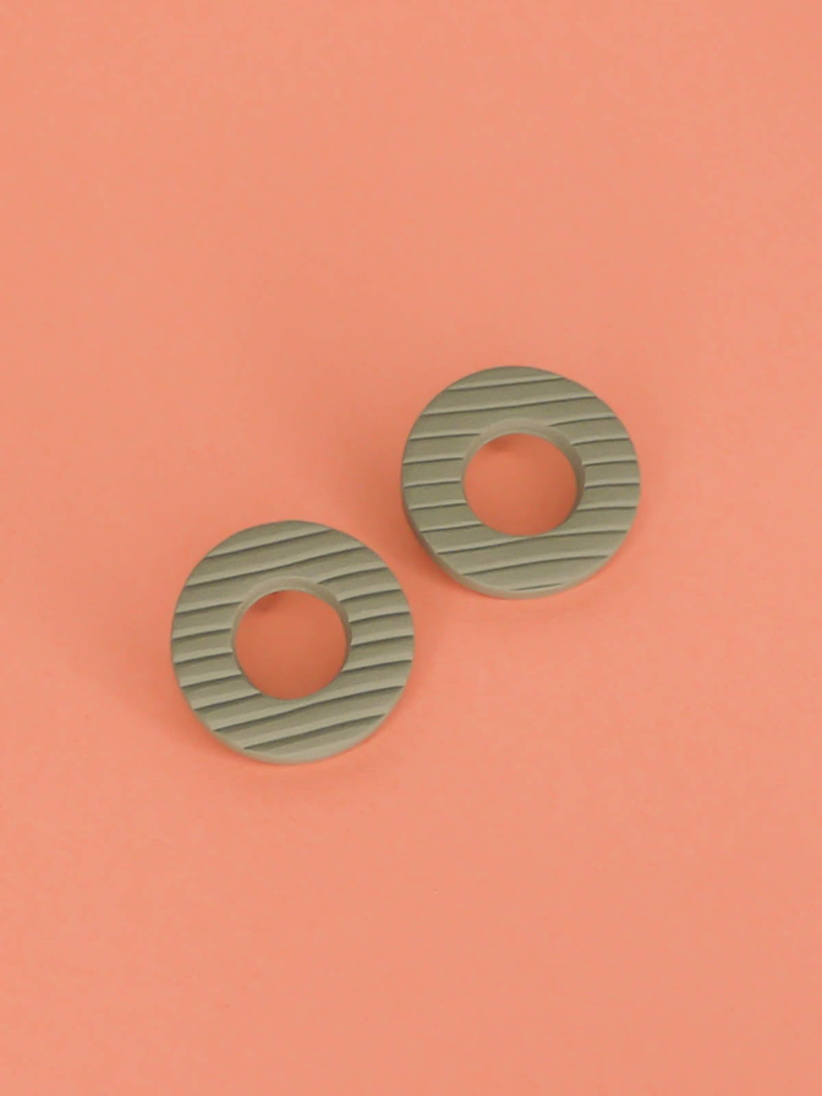 Sage green textured stripe hoop stud earrings, made out of polymer clay with stainless steel posts