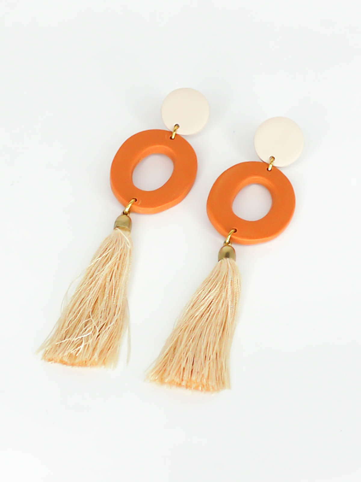 Long lightweight 3 tier tassel statement earrings with a polymer clay beige stud, connected to a terracotta hoop & a beige tassel