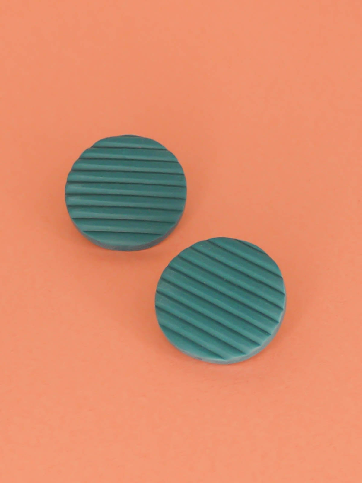 Polymer clay turquoise disk stud statement earrings with textured stripe pattern