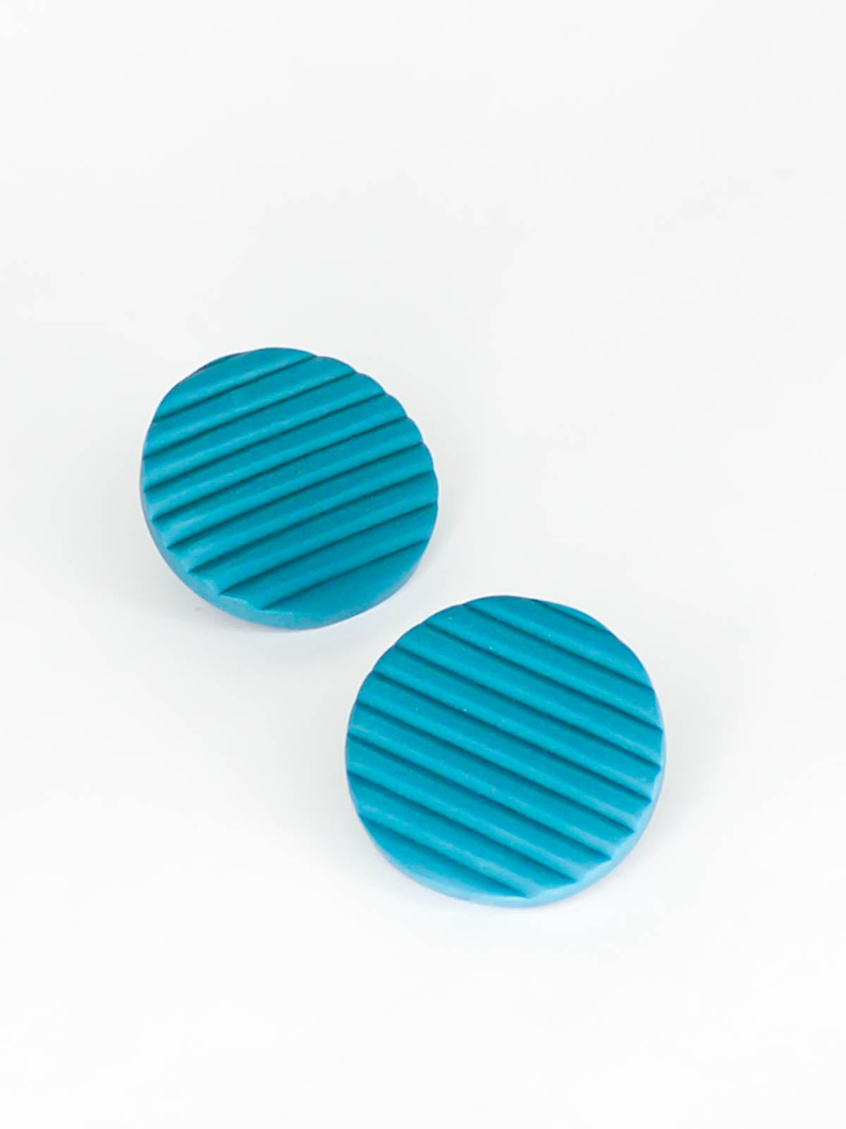 Polymer clay turquoise disk stud statement earrings with textured stripe pattern