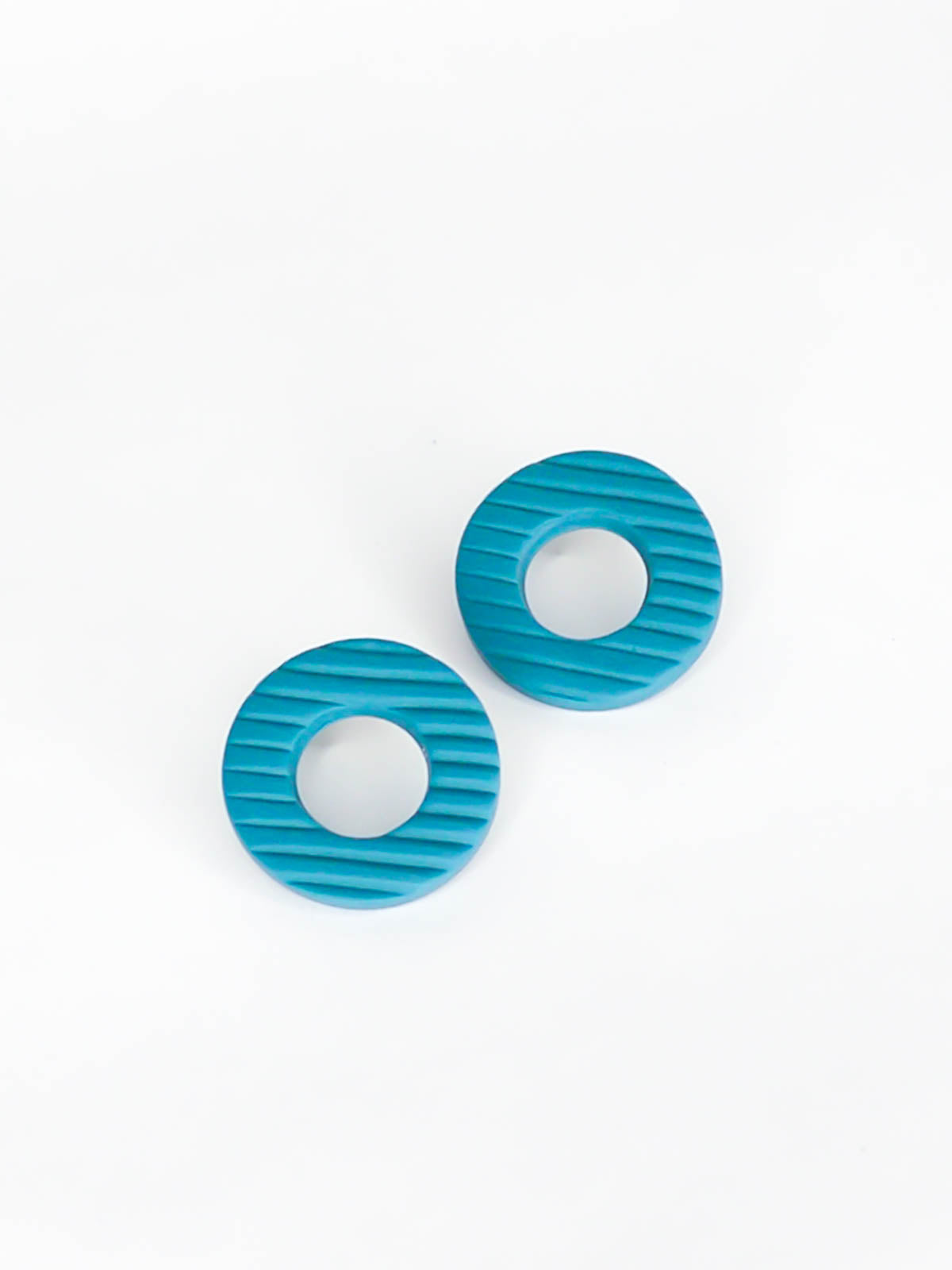 Turquoise hoop stud statement earrings made out of polymer clay with stainless steel posts